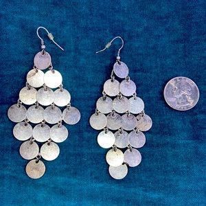 Silver dangle earrings.